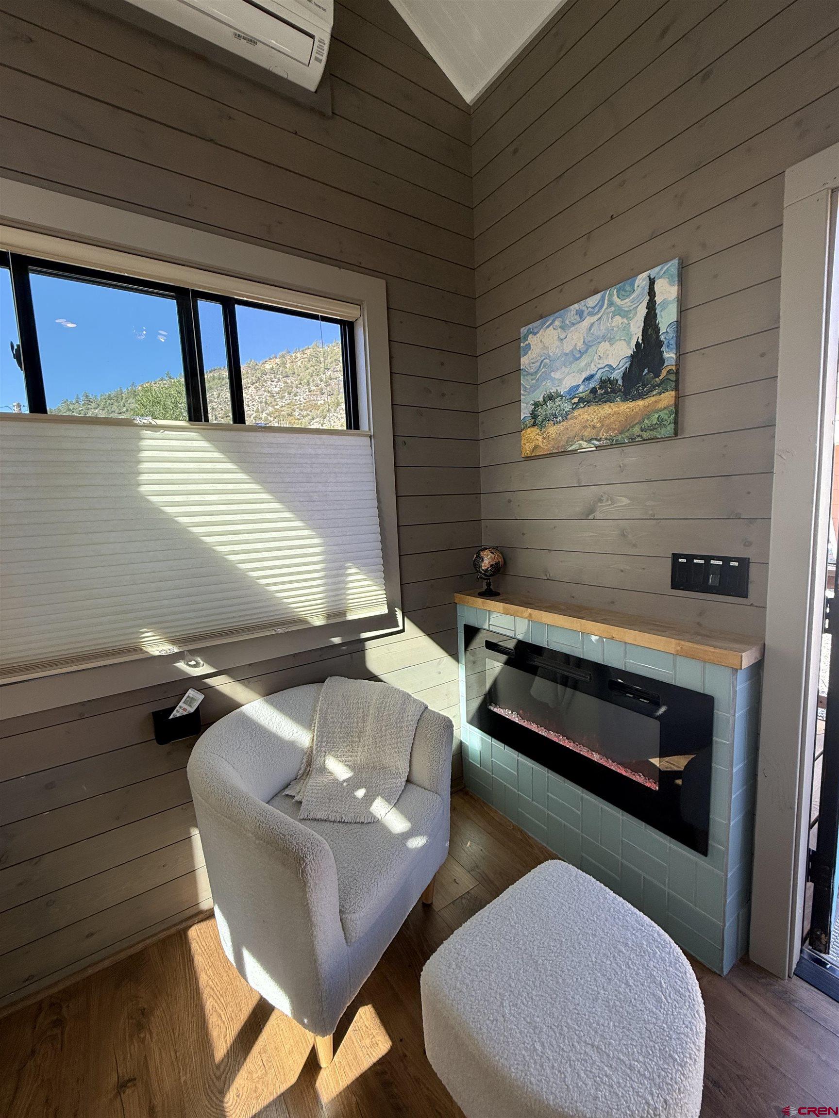 90 Animas View Drive, Unit 5 Durango, CO 81301 - Photo 15 of 30 a room with furniture and a potted plant