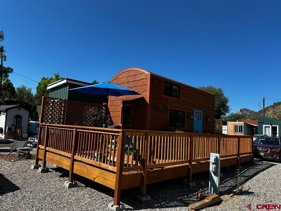 90 Animas View Drive, Unit 5 Durango, CO 81301 - Photo 2 of 30 a view of a house with wooden fence