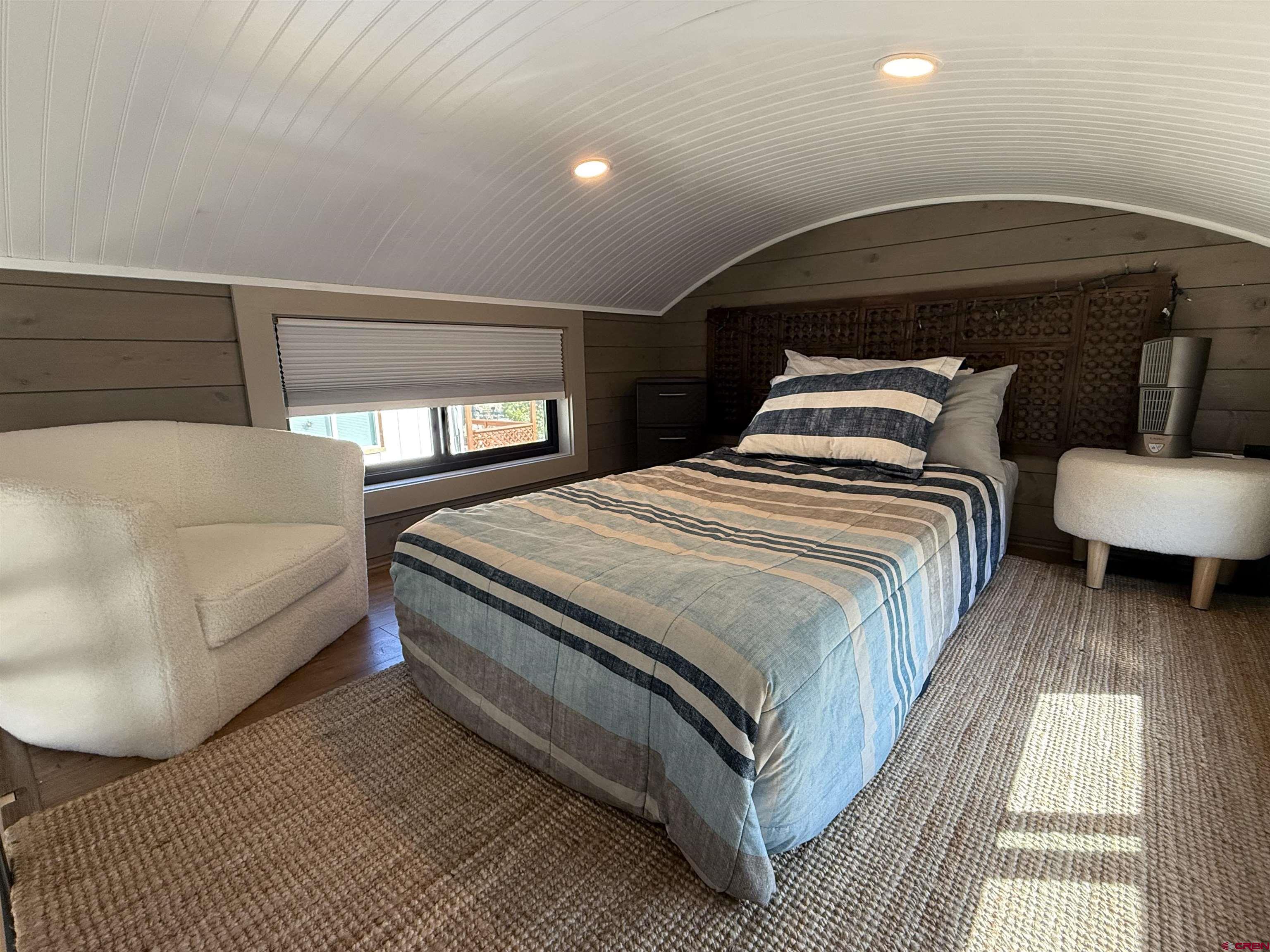 90 Animas View Drive, Unit 5 Durango, CO 81301 - Photo 27 of 30 a bedroom with bed and a night stand