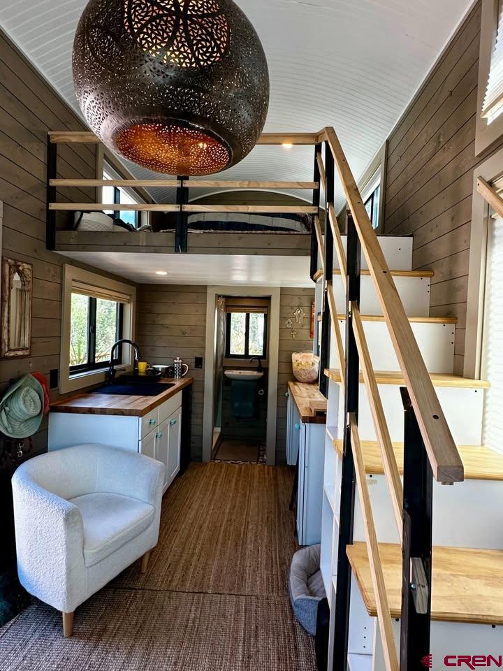 90 Animas View Drive, Unit 5 Durango, CO 81301 - Photo 6 of 30 a living room with furniture and a fireplace