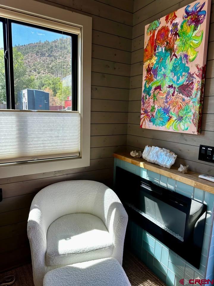 90 Animas View Drive, Unit 5 Durango, CO 81301 - Photo 7 of 30 a living room with a couch and a large window