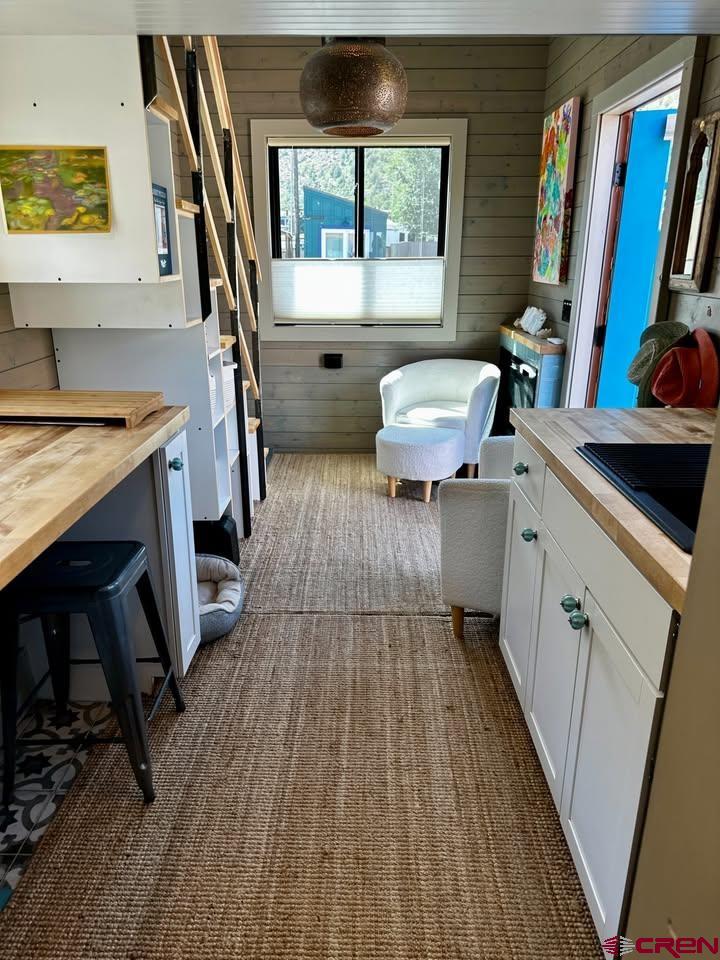 90 Animas View Drive, Unit 5 Durango, CO 81301 - Photo 8 of 30 a living room with a couch and a table