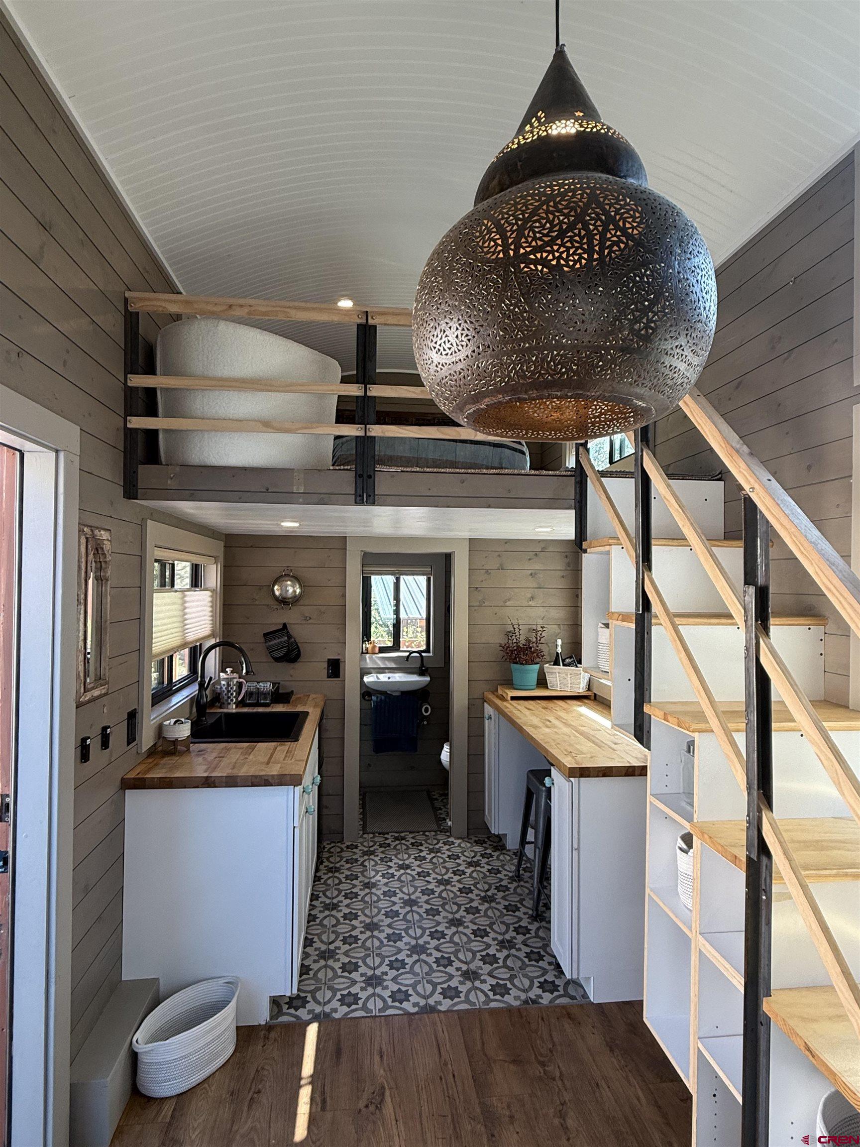 90 Animas View Drive, Unit 5 Durango, CO 81301 - Photo 10 of 30 a kitchen with granite countertop lots of counter top space and stainless steel appliances