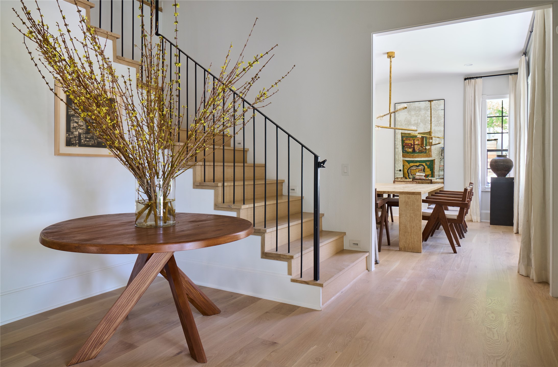 3020 Duke Street Houston, TX 77005 - Photo 2 of 23 Welcoming entry with hardwood floors and one of two staircase access points.