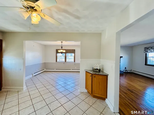 a view of a kitchen with a sink and cabinets