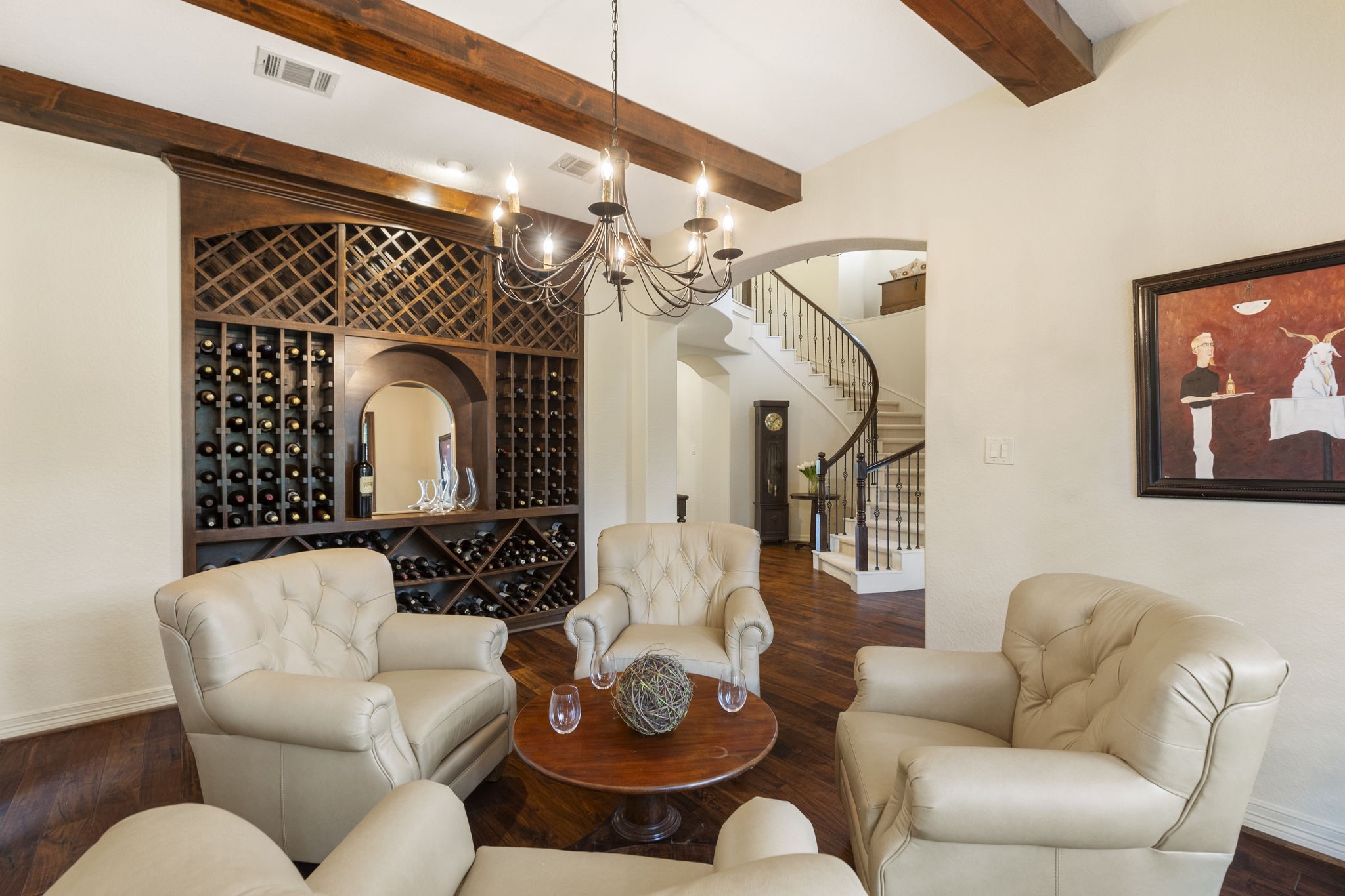 28227 KAILEES Court Spring, TX 77386 - Photo 12 of 48 The wall of custom built-ins create the perfect setting for dining, entertaining, or showcasing a curated wine collection.