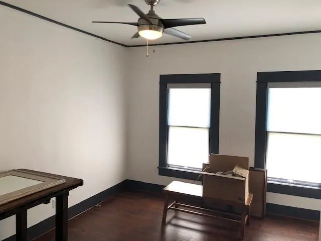 a room with furniture and a window