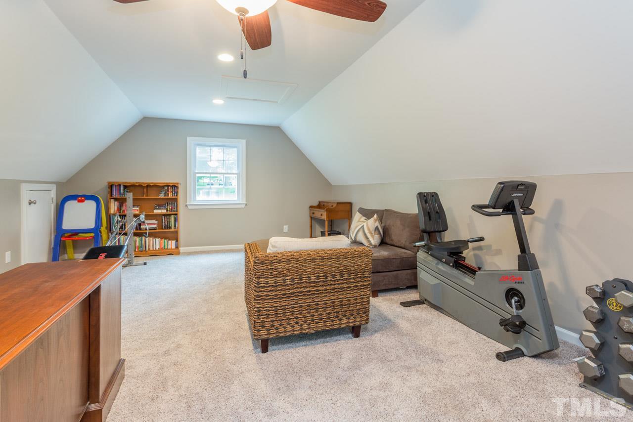 412 Amelia Avenue Raleigh, NC 27615 - Photo 20 of 25 a bedroom with furniture and a window