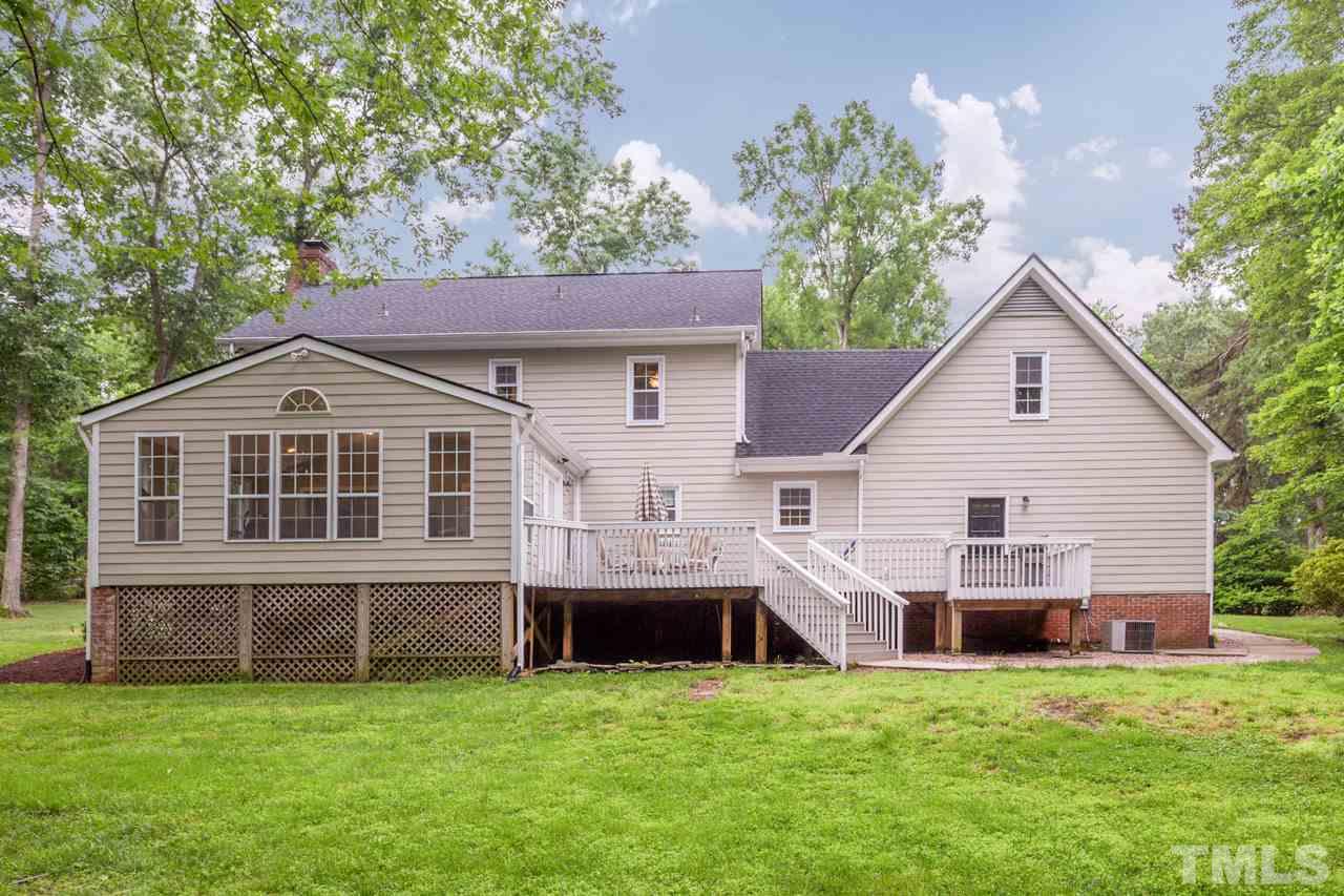 412 Amelia Avenue Raleigh, NC 27615 - Photo 23 of 25 a view of a house with a yard