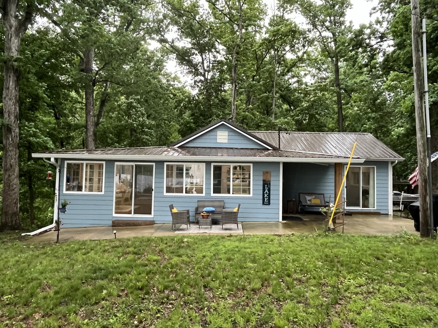 1890 Lackey Lane Centralia, IL 62801 - Photo 24 of 30 a front view of a house with a yard table and chairs