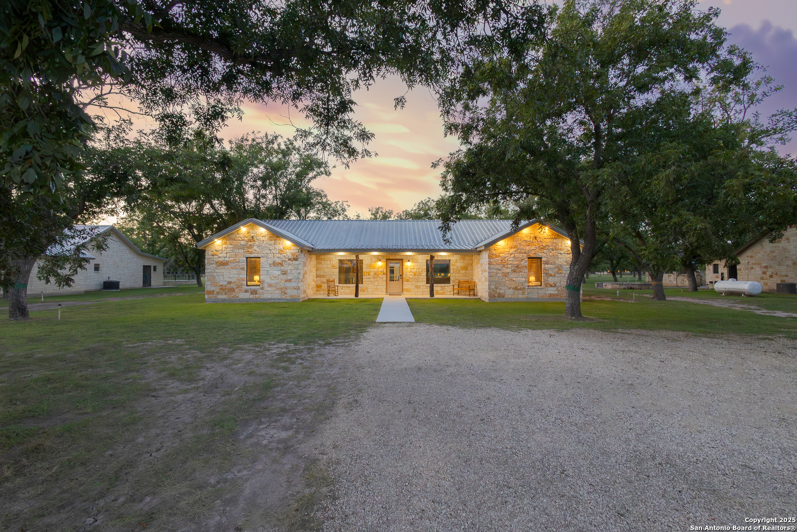 370 Johnny Seibert Rio Frio, TX 78873 - Photo 2 of 40 a view of a house with a yard and garage
