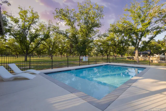 a view of house with outdoor seating