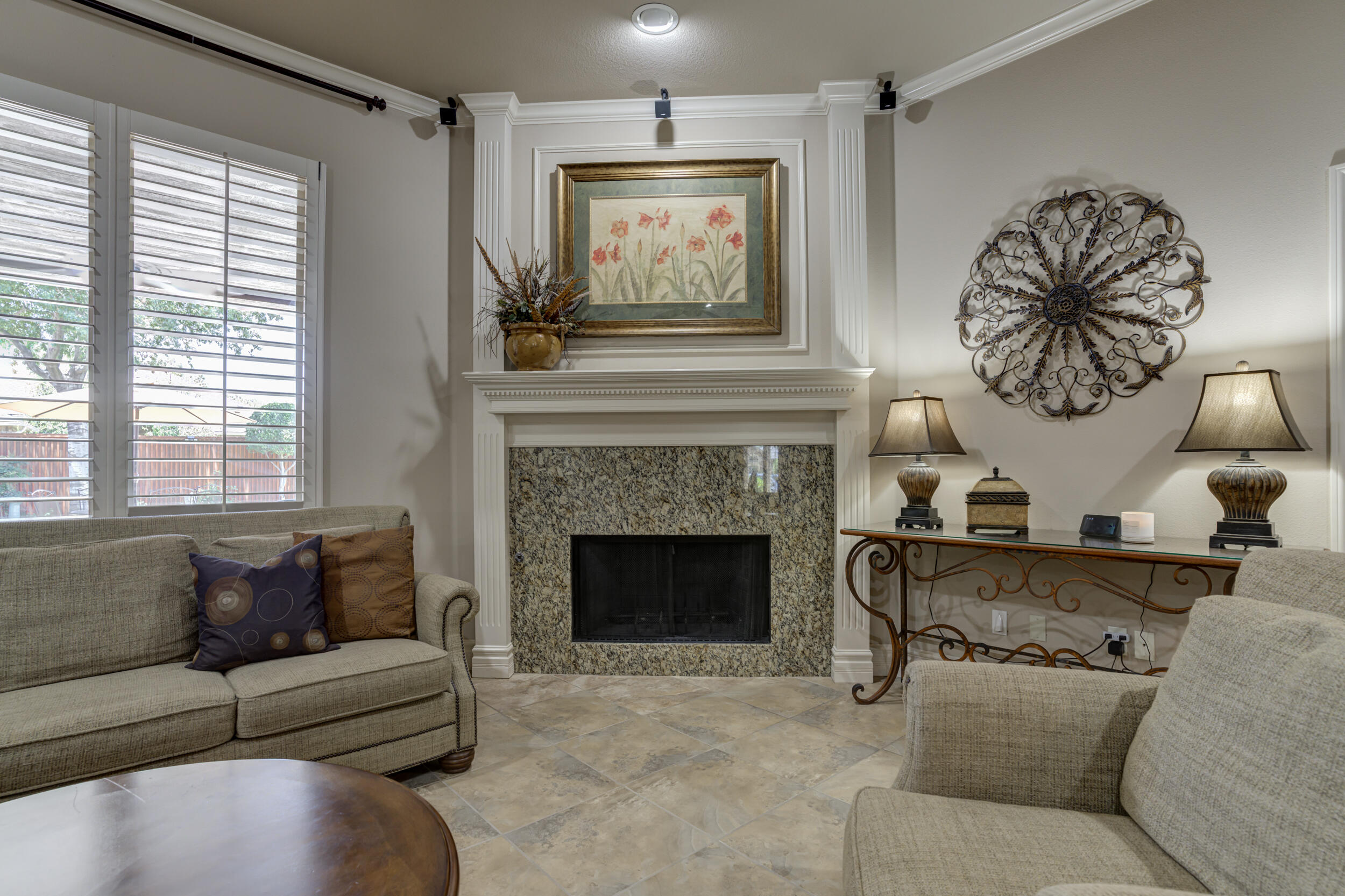 6008 89th Street Lubbock, TX 79424 - Photo 15 of 61 a living room with furniture and a fireplace