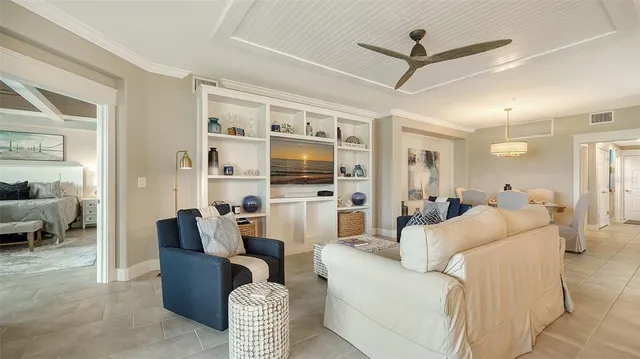 a kitchen with stainless steel appliances granite countertop a sink and wooden cabinets