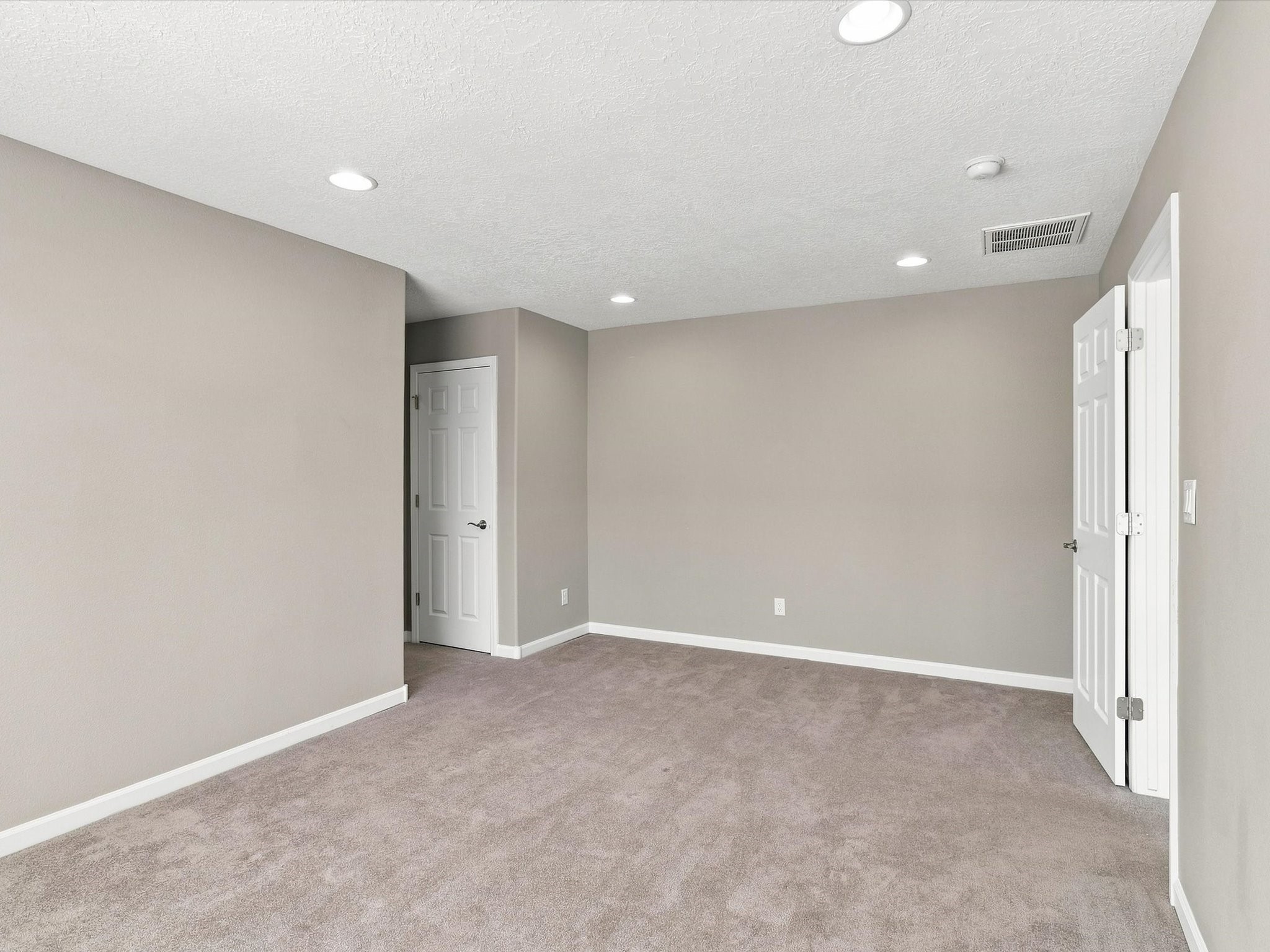 4642 Rail Runner Road Santa Fe, NM 87507 - Photo 42 of 74 The second bedroom is thoughtfully designed with a private bath and walk-in closet.