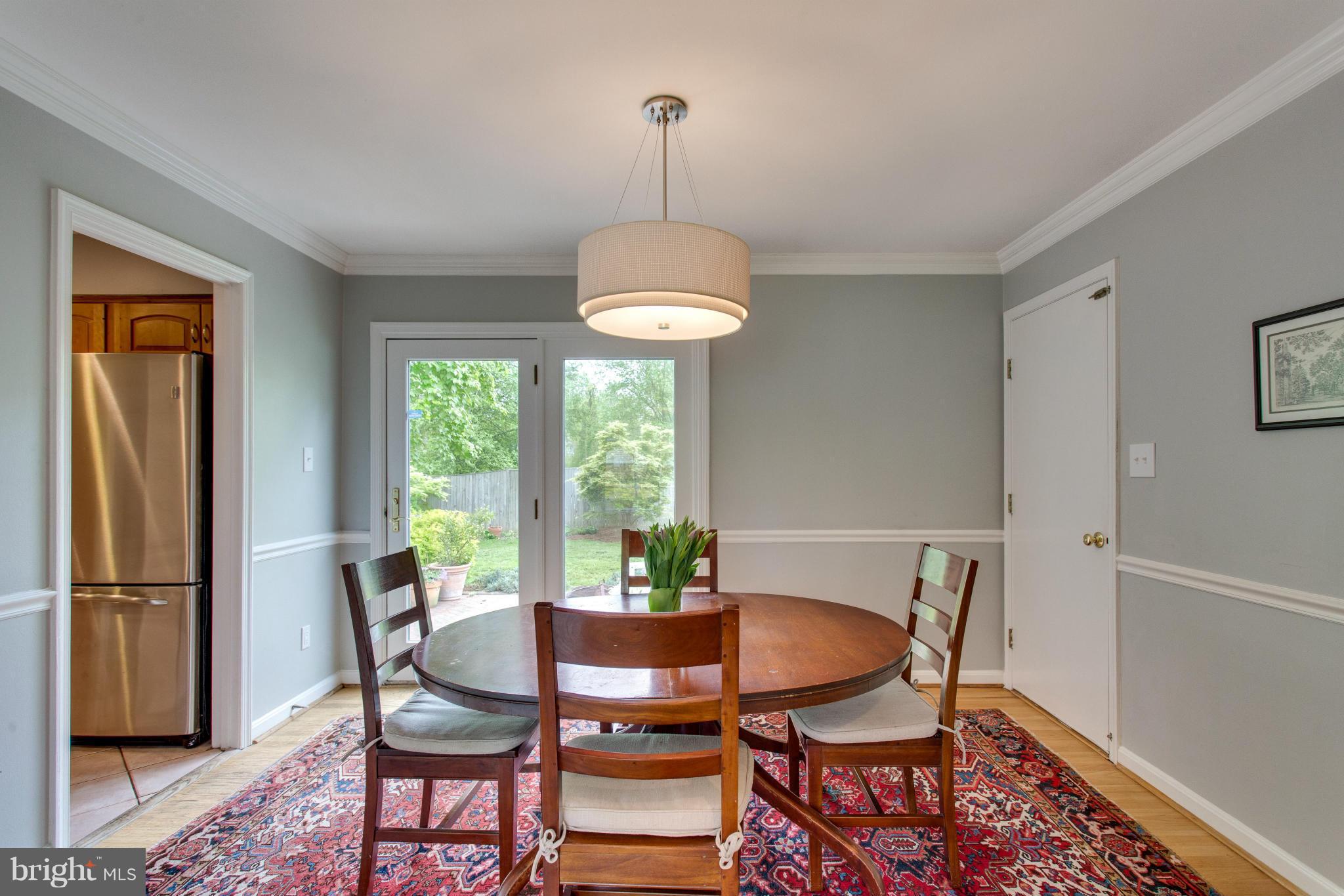 8735 Fort Hunt Road Alexandria, VA 22308 - Photo 11 of 30 Dining room opens to backyard and garage