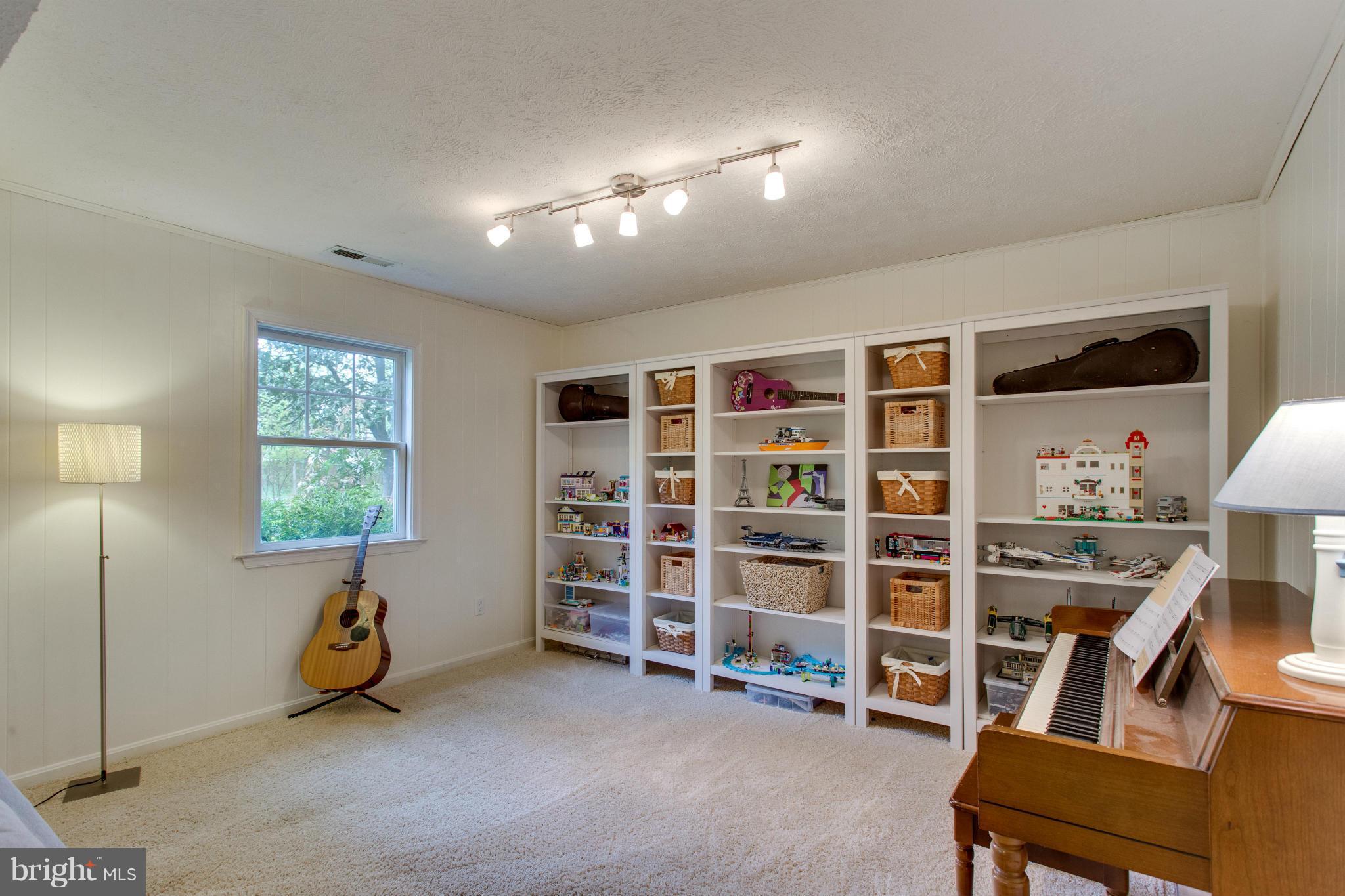 8735 Fort Hunt Road Alexandria, VA 22308 - Photo 21 of 30 Wood paneling and wall to wall carpet