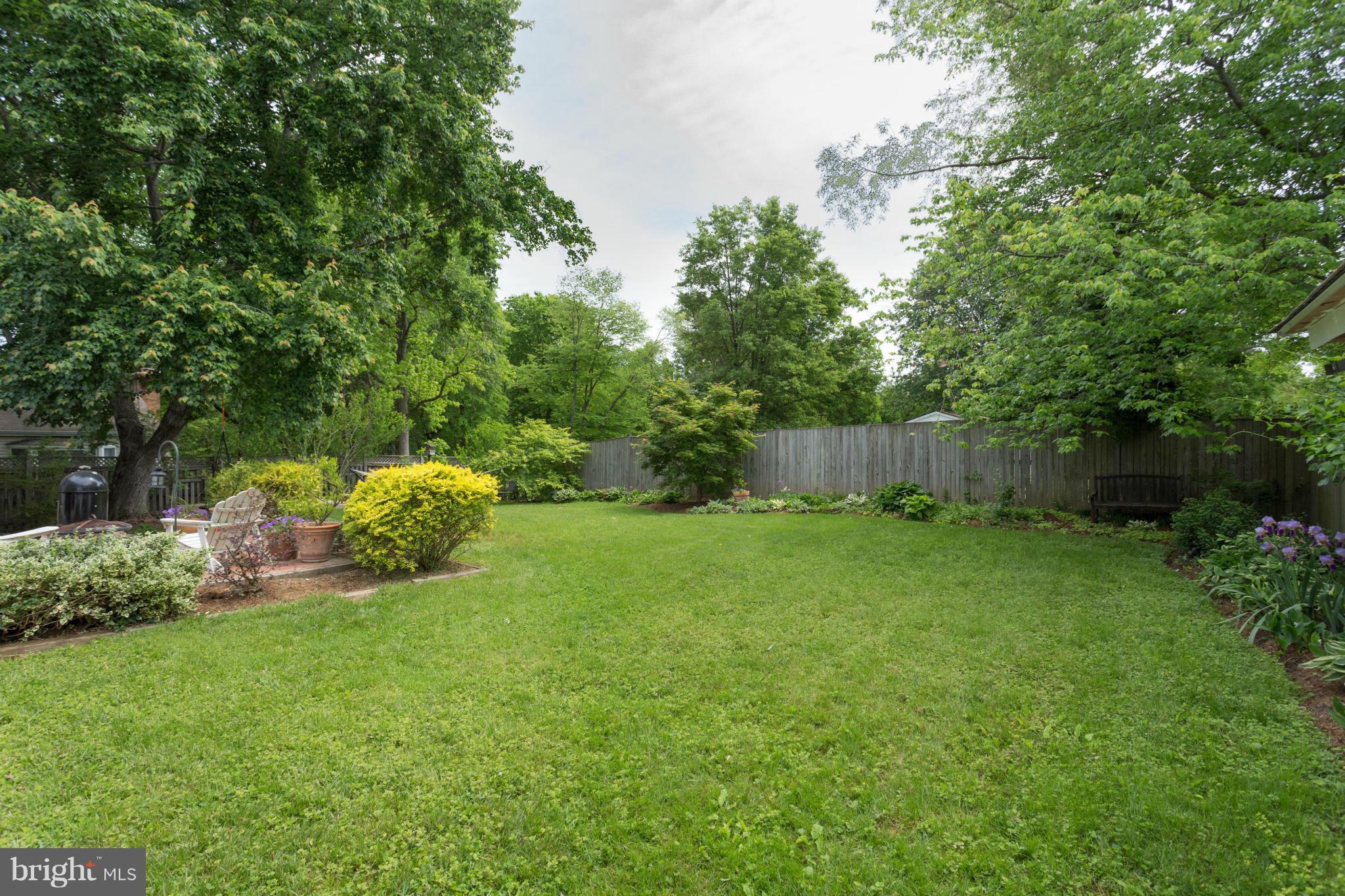 8735 Fort Hunt Road Alexandria, VA 22308 - Photo 27 of 30 Backyard affords privacy and great spaces for play