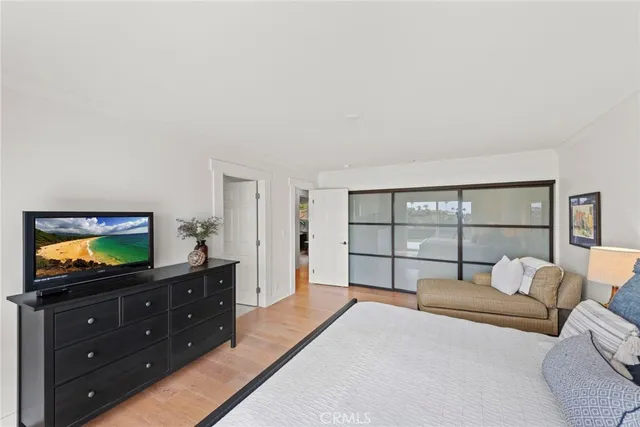 a bathroom with a double vanity sink mirror and shower