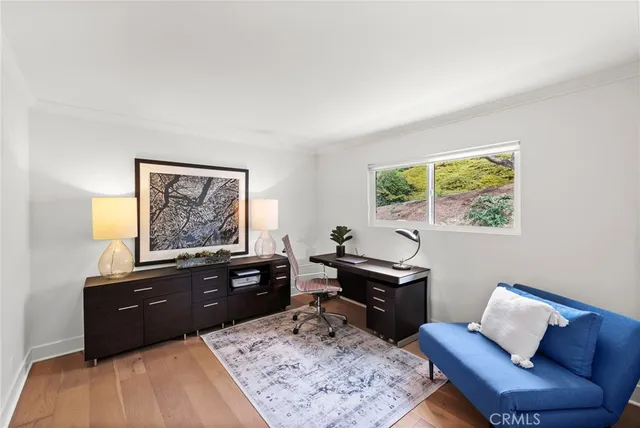 a bathroom with a sink a mirror and a shower