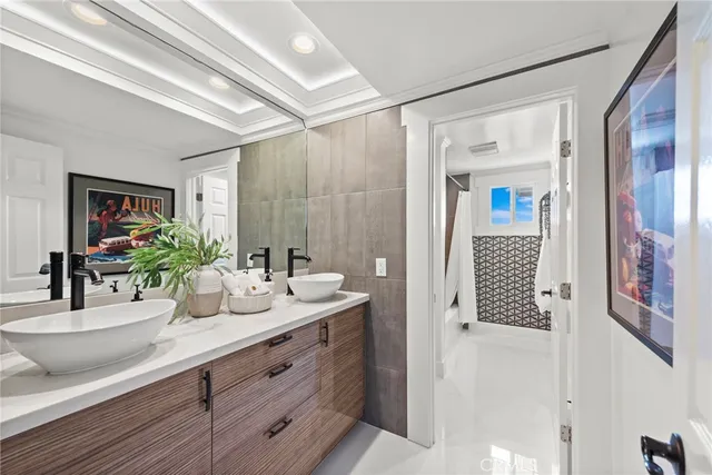 a bathroom with a bathtub and shower