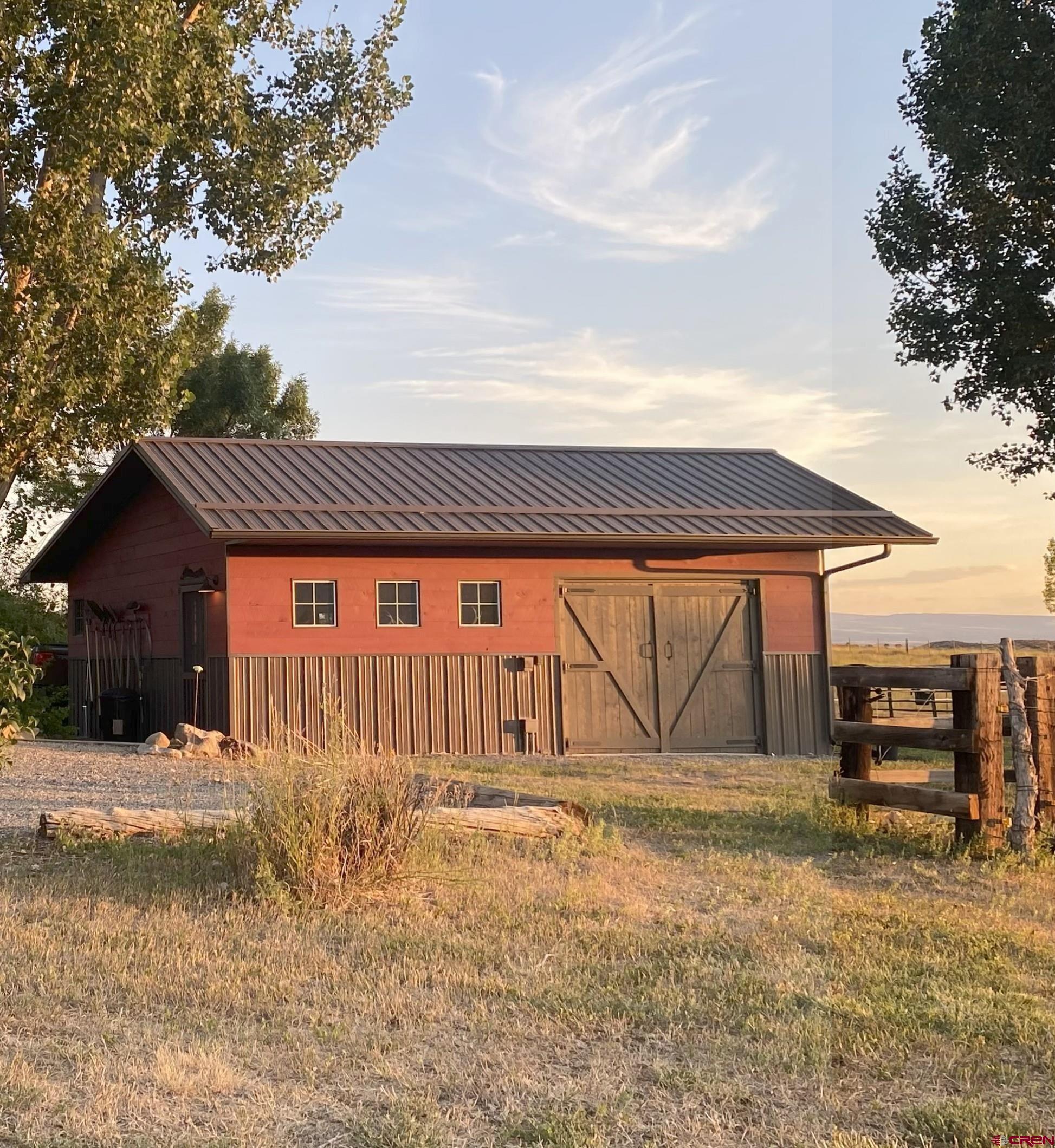 11450 Crawford Road Paonia, CO 81428 - Photo 25 of 41 a front view of a house with a yard