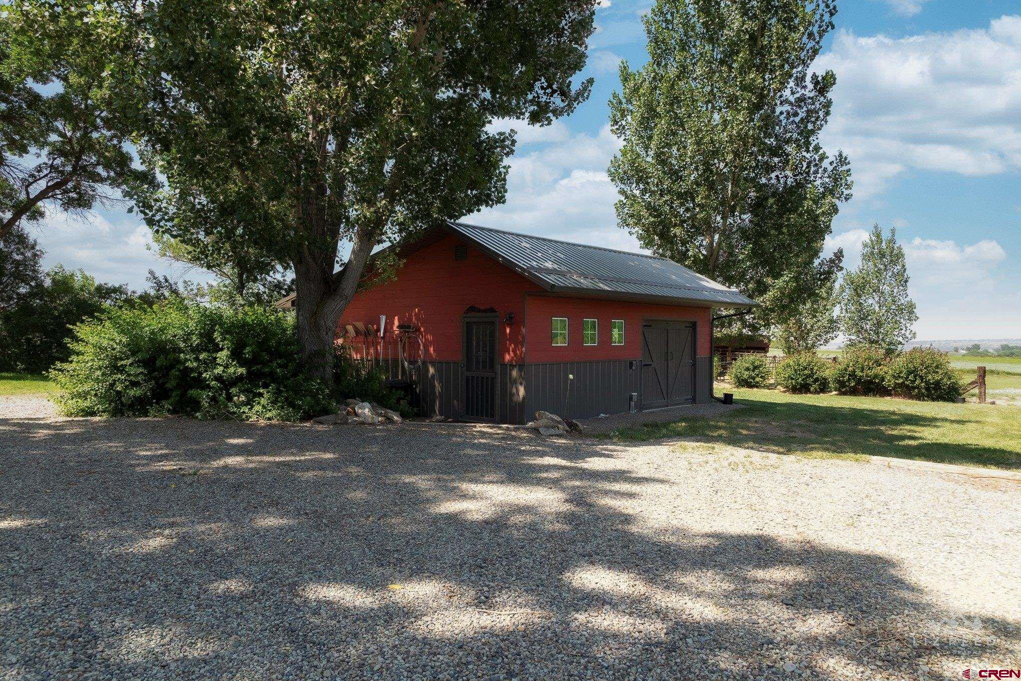 11450 Crawford Road Paonia, CO 81428 - Photo 27 of 41 a view of a house with a yard