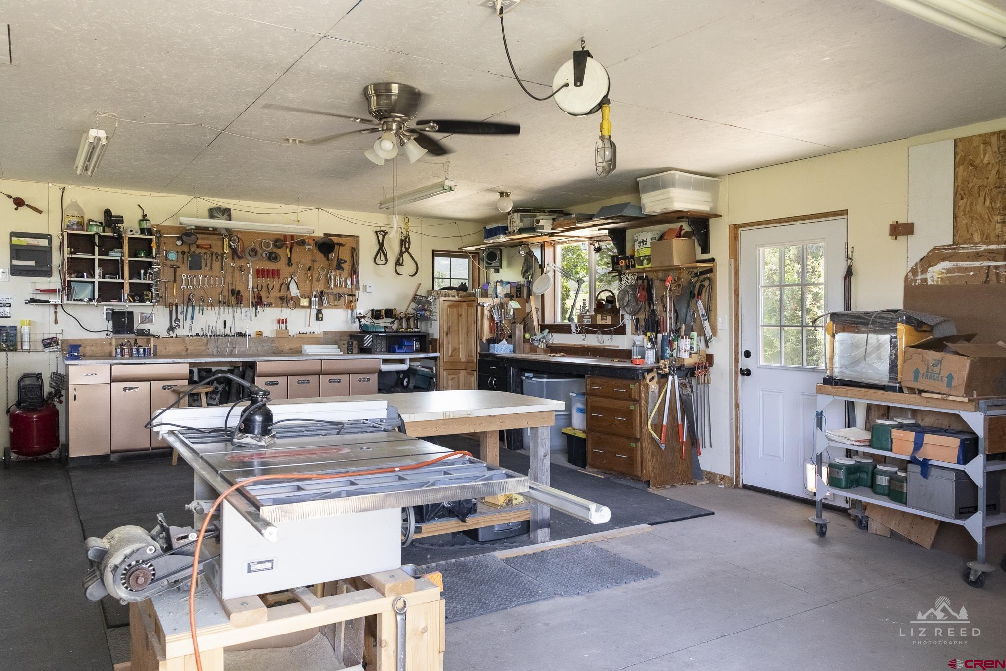 11450 Crawford Road Paonia, CO 81428 - Photo 28 of 41 a living room with lots of furniture and kitchen