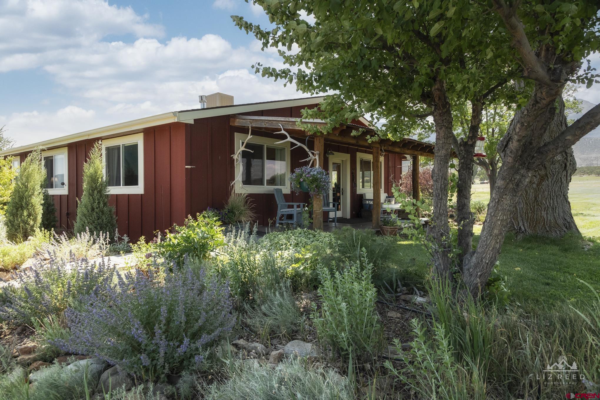 11450 Crawford Road Paonia, CO 81428 - Photo 3 of 41 a view of house with green space