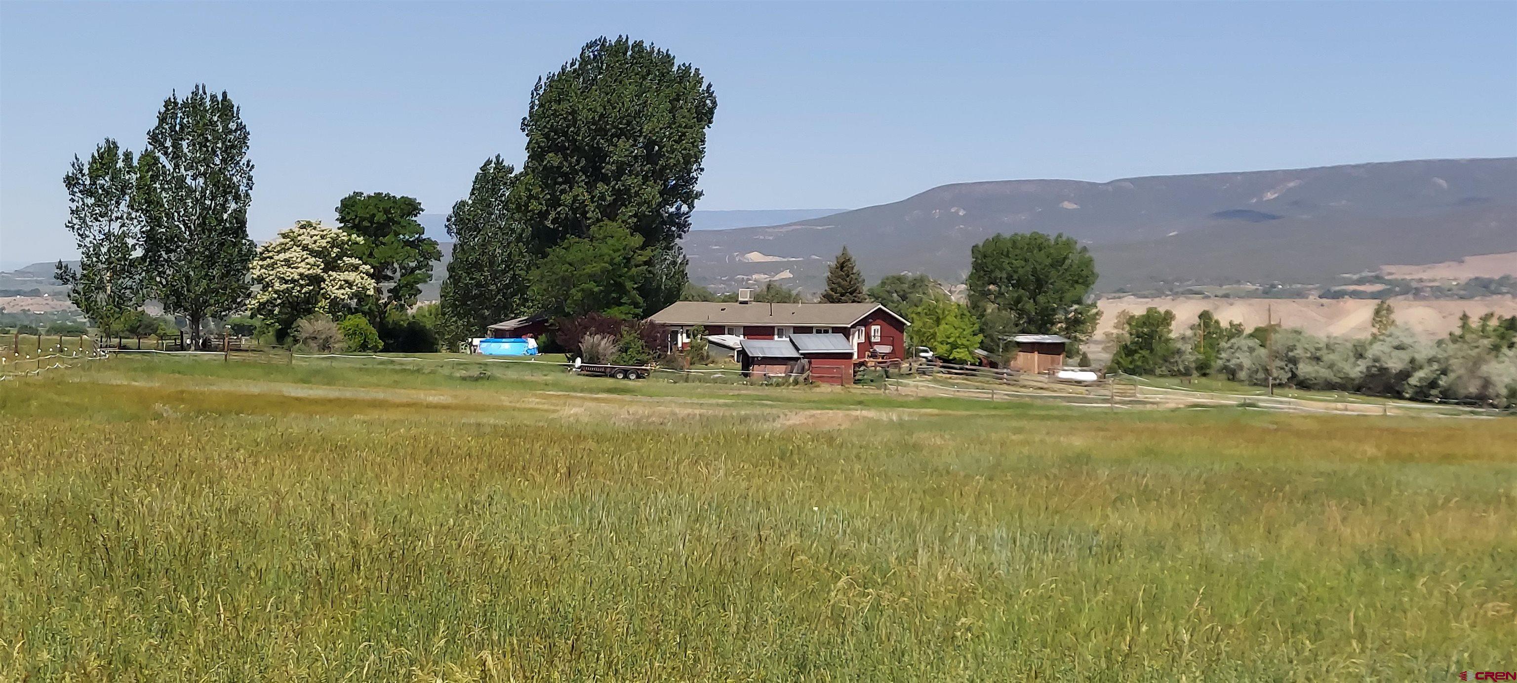 11450 Crawford Road Paonia, CO 81428 - Photo 33 of 41 a view of a town with mountains in the background