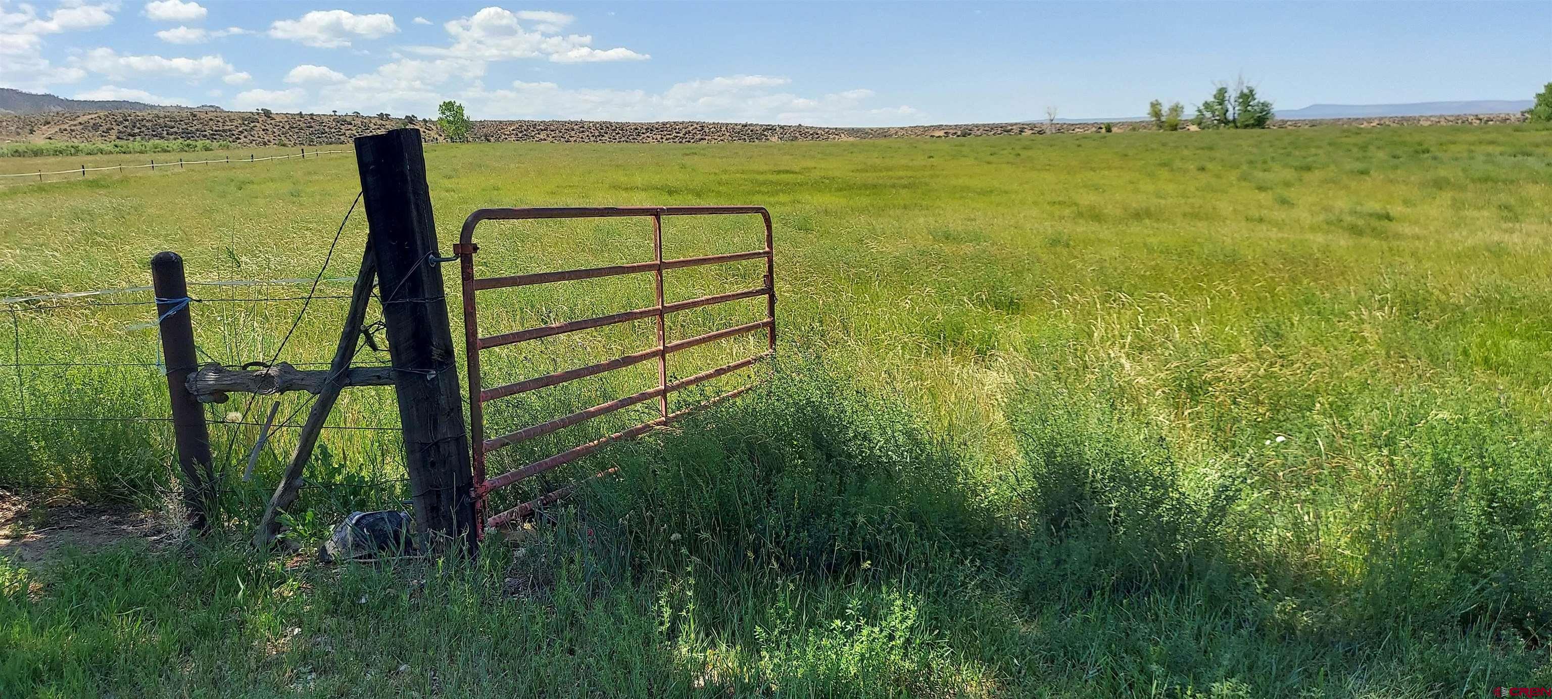 11450 Crawford Road Paonia, CO 81428 - Photo 38 of 41 a view of an ocean from a balcony