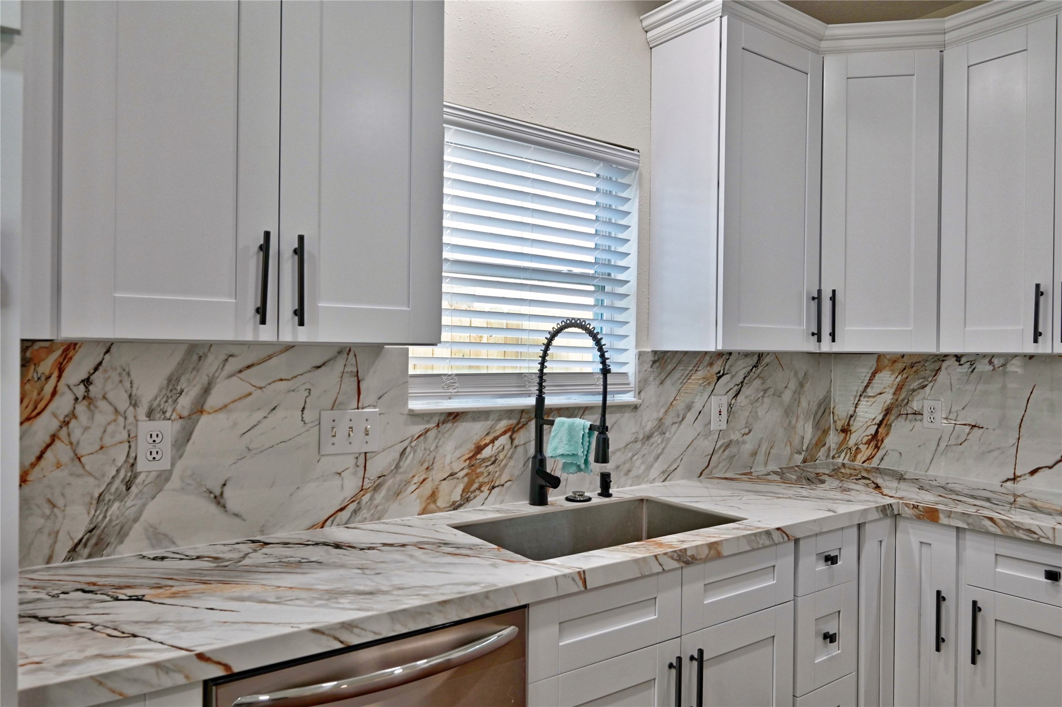 17907 Pelican Way Road Houston, TX 77084 - Photo 12 of 38 a kitchen with a sink and cabinets