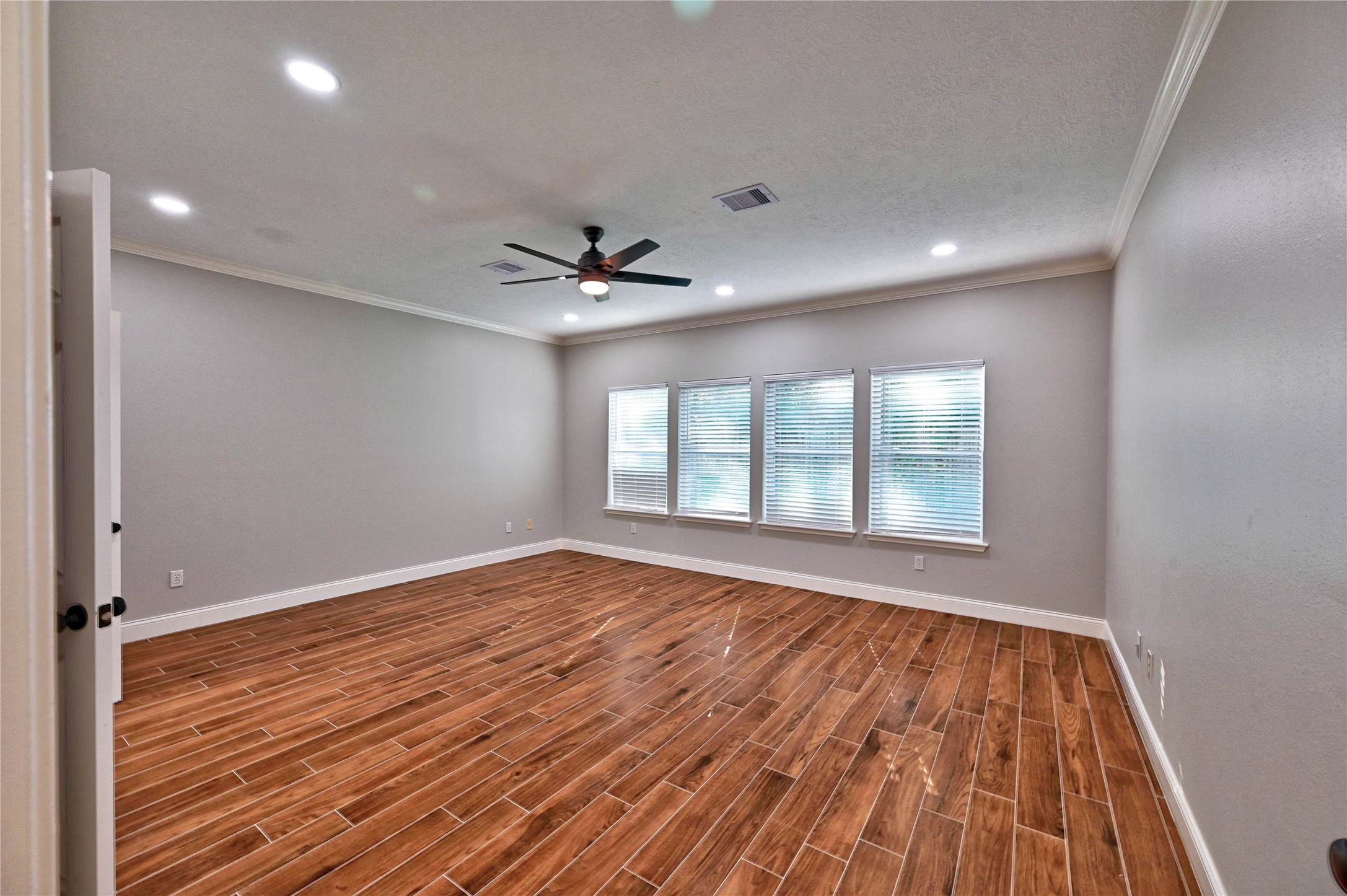 17907 Pelican Way Road Houston, TX 77084 - Photo 25 of 38 wooden floor in an empty room with a window