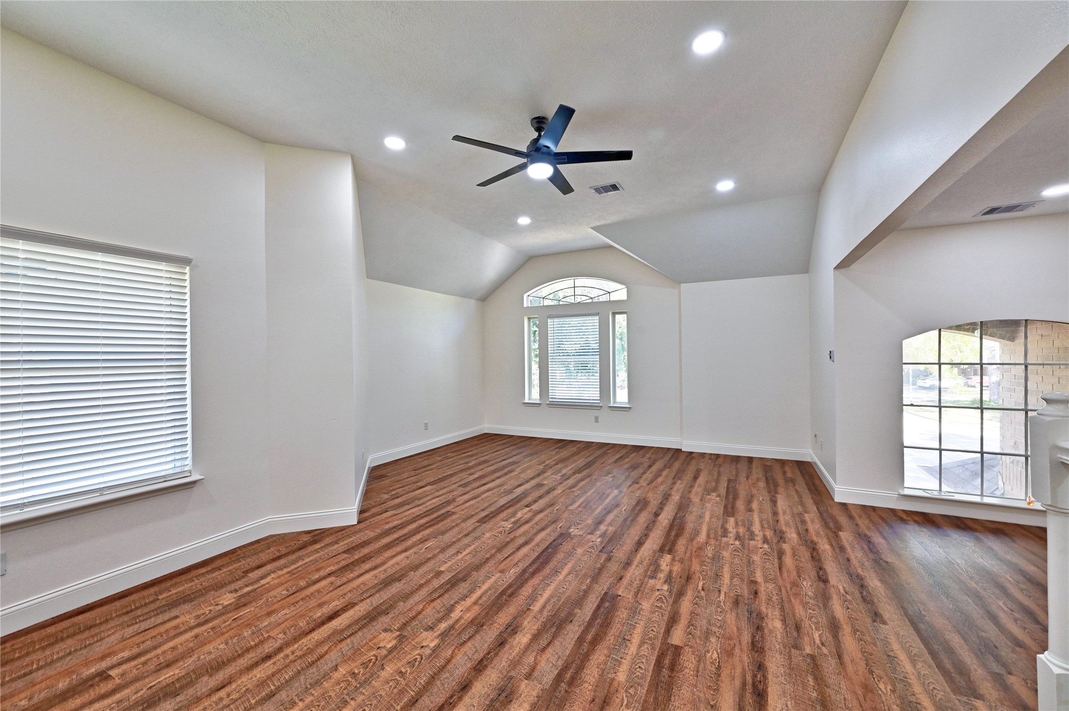 17907 Pelican Way Road Houston, TX 77084 - Photo 27 of 38 wooden floor in an empty room with a window