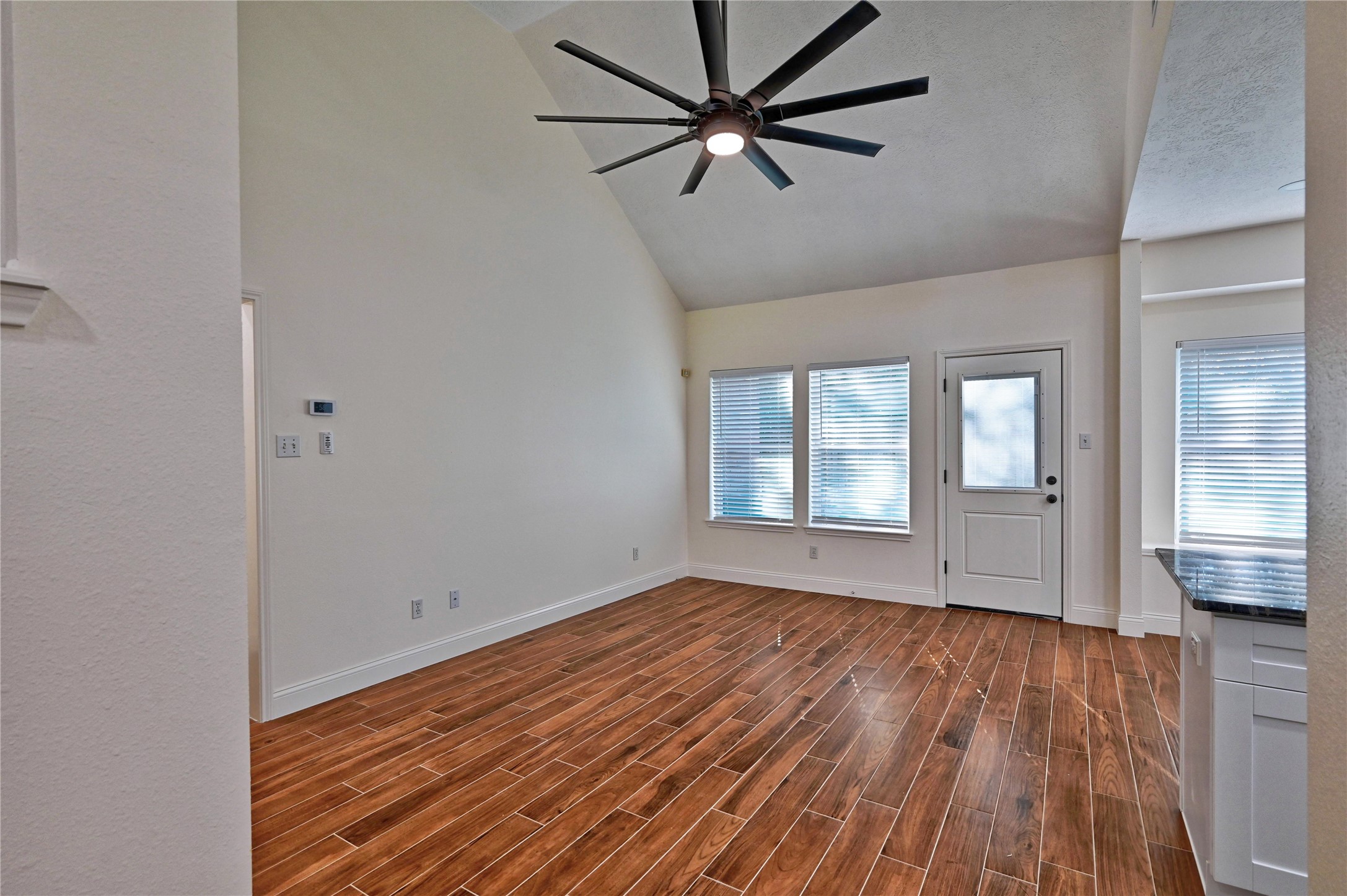 17907 Pelican Way Road Houston, TX 77084 - Photo 8 of 38 wooden floor in an empty room with a window