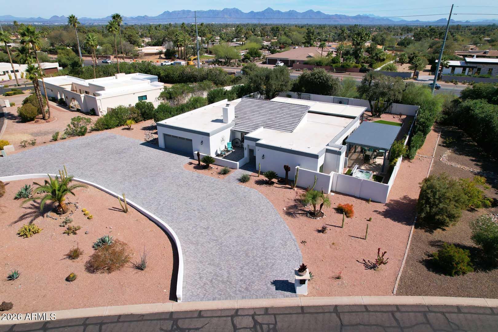 4641 East Mountain View Road Phoenix, AZ 85028 - Photo 42 of 44 an aerial view of a house with a yard