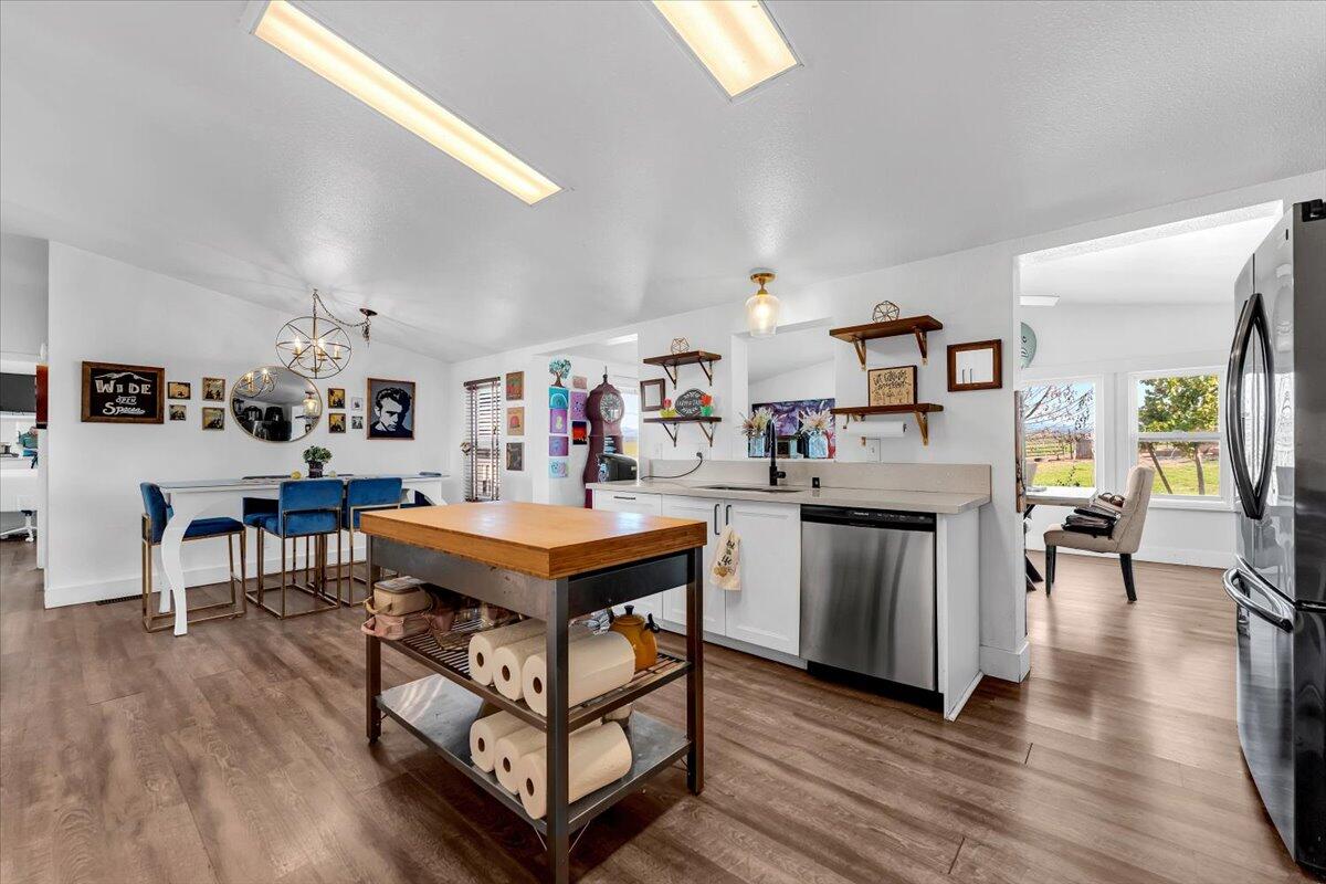 23504 Dersch Road Anderson, CA 96007 - Photo 16 of 54 a living room with lots of furniture and kitchen view