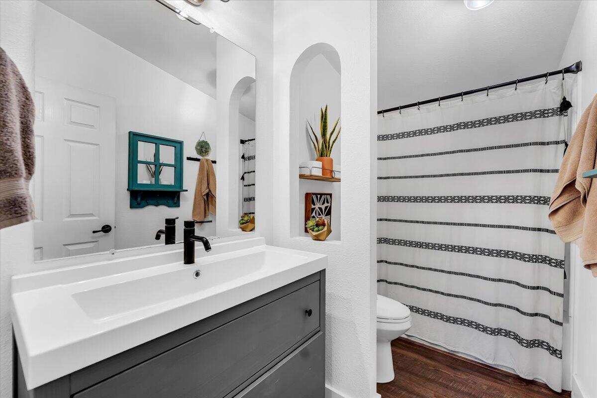 23504 Dersch Road Anderson, CA 96007 - Photo 30 of 54 a bathroom with a sink and a mirror