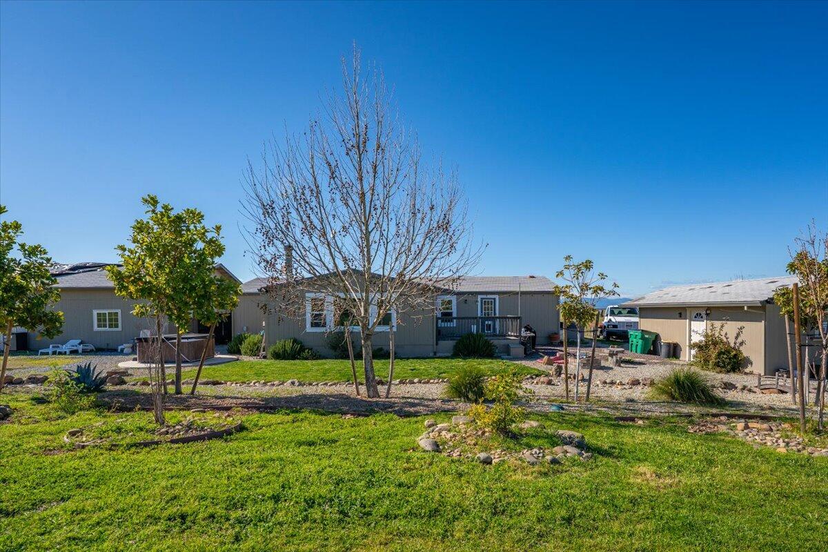 23504 Dersch Road Anderson, CA 96007 - Photo 32 of 54 a view of a house with a yard porch and sitting area