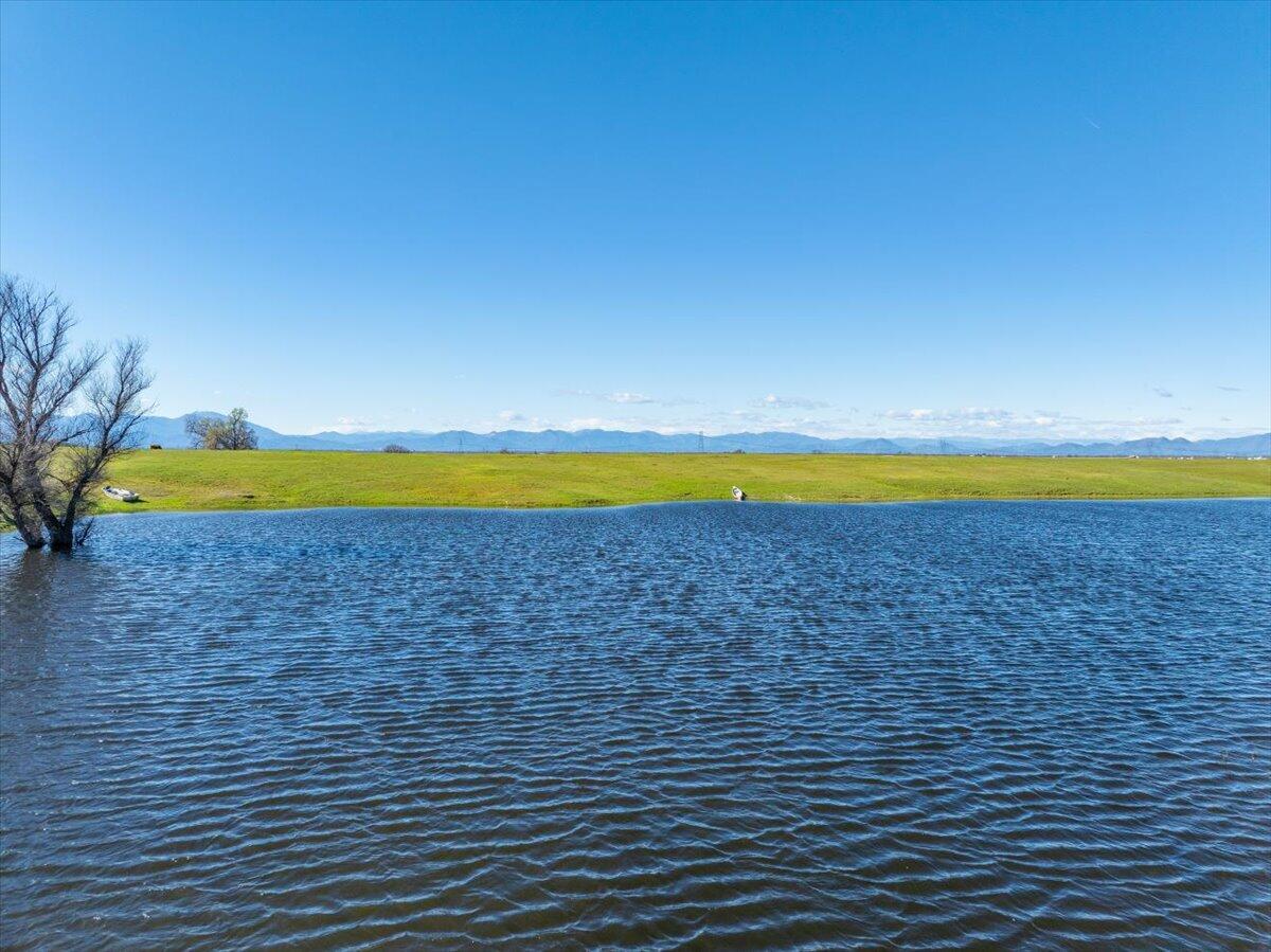 23504 Dersch Road Anderson, CA 96007 - Photo 6 of 54 a view of an empty room with an outdoor space