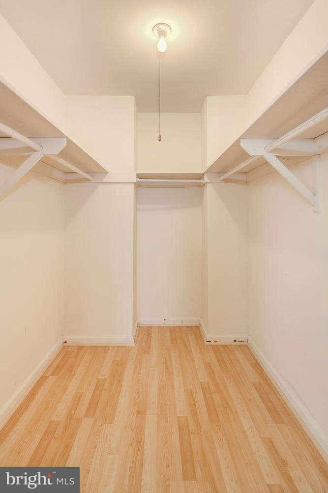 1300 South Arlington Ridge Road, Unit 304 Arlington, VA 22202 - Photo 15 of 19 a view of a room with wooden floor