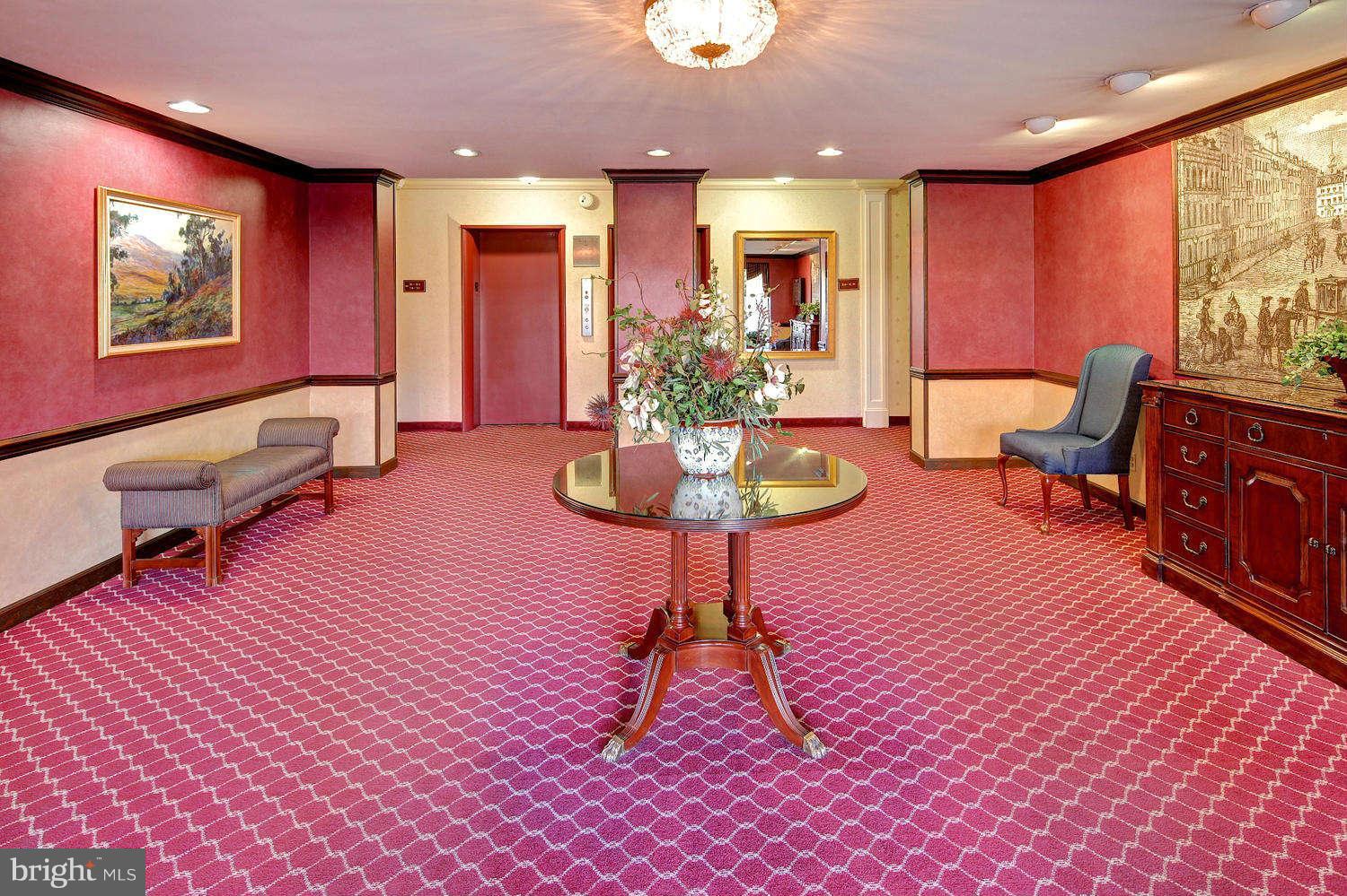 1300 South Arlington Ridge Road, Unit 304 Arlington, VA 22202 - Photo 19 of 19 a living room with furniture a rug and a large window