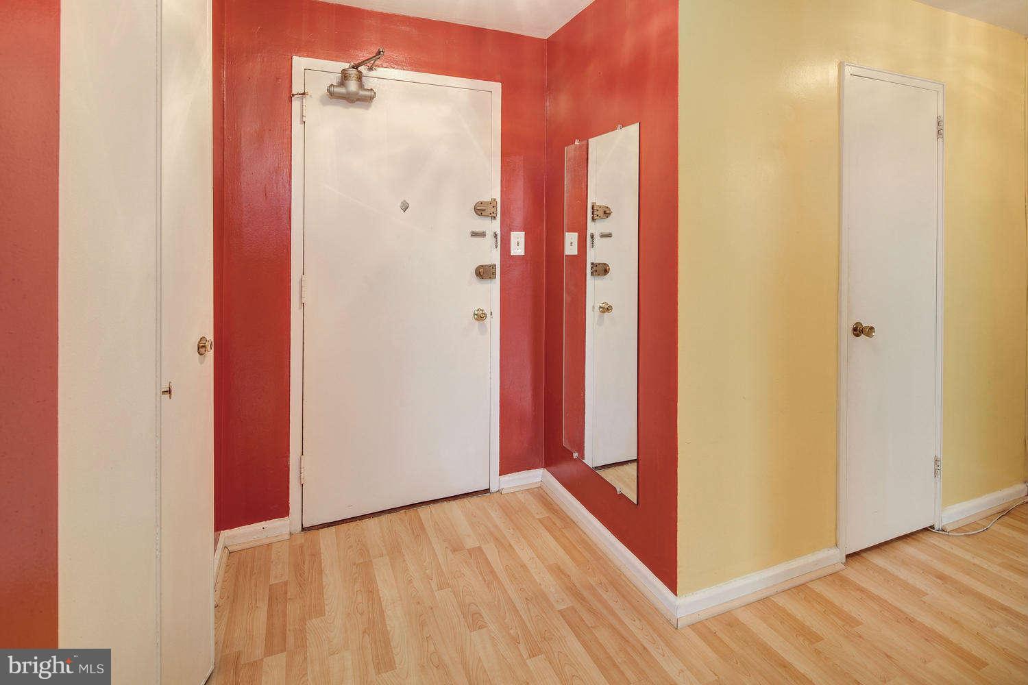 1300 South Arlington Ridge Road, Unit 304 Arlington, VA 22202 - Photo 3 of 19 a view of a bathroom with a shower and a sink