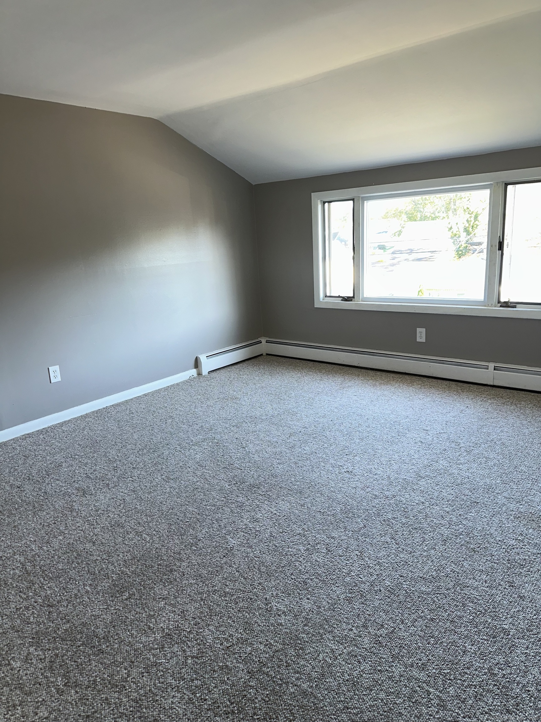 466 Merritt Street Bridgeport, CT 06606 - Photo 4 of 12 an empty room with a window