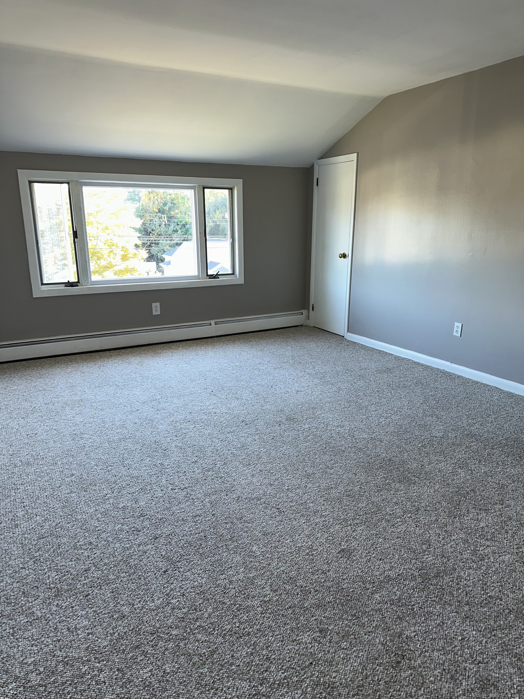 466 Merritt Street Bridgeport, CT 06606 - Photo 5 of 12 a view of an empty room with a window