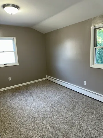 an empty room with a window