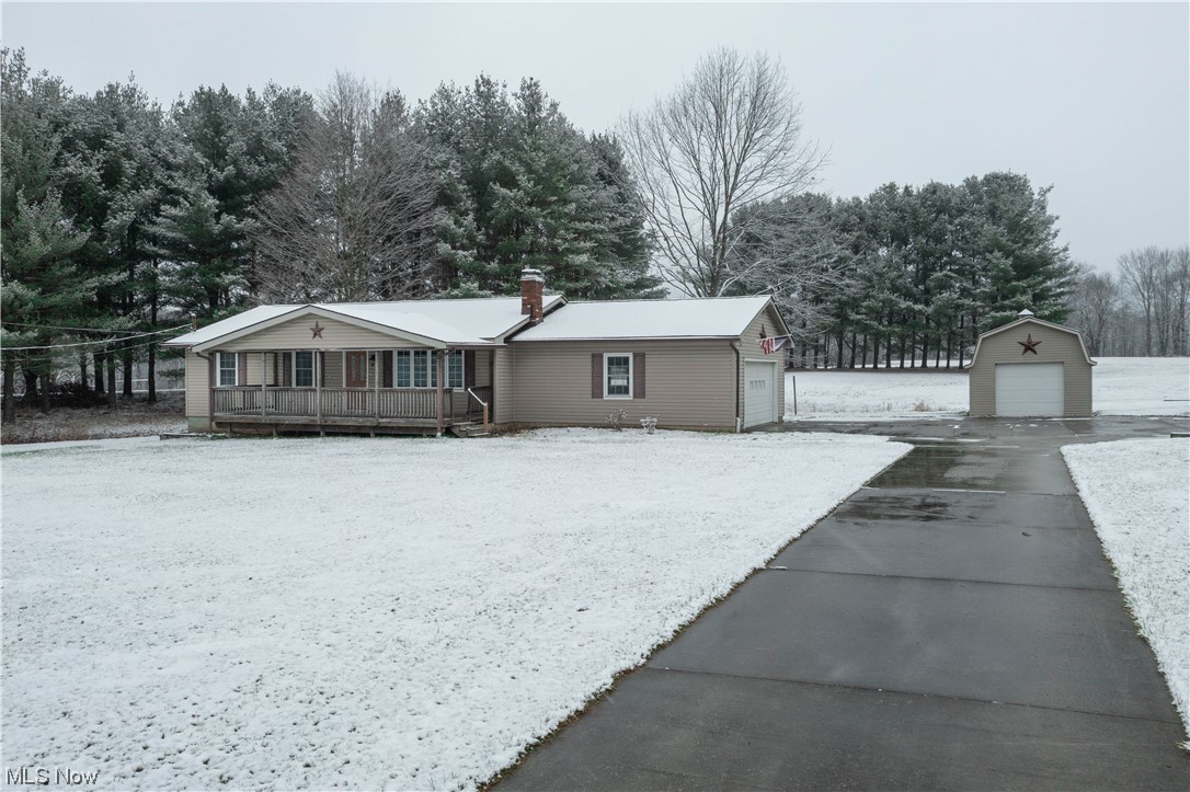 6021 Everett Hull Road Fowler, OH 44418 - Photo 1 of 28 View of front of home with a garage