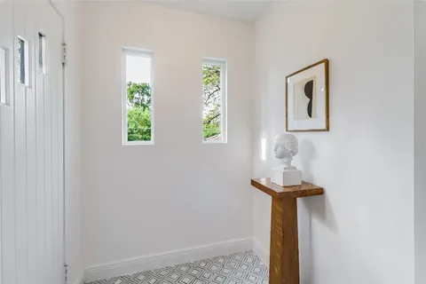 a view of entryway with wooden floor