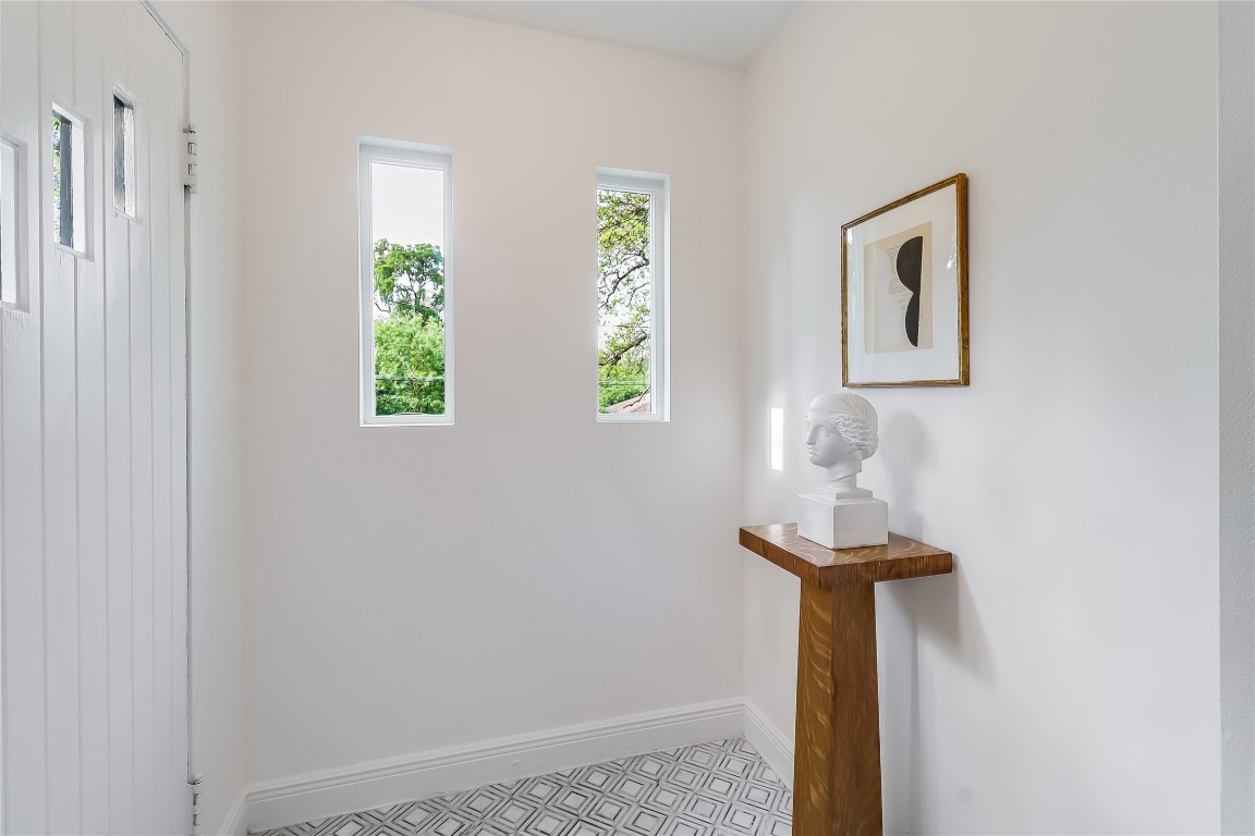 803 Rutherford Place Austin, TX 78704 - Photo 19 of 28 a view of entryway with wooden floor