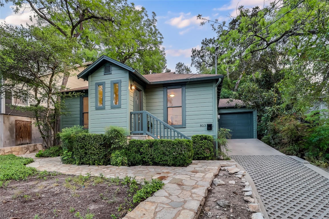 803 Rutherford Place Austin, TX 78704 - Photo 2 of 28 a front view of a house with garden